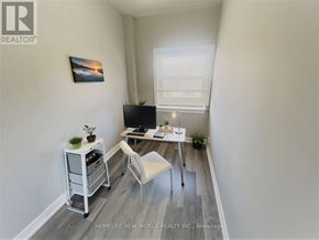 Toronto (Caledonia-Fairbank) apartment for rent - A small room with a desk and a chair.