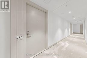 Toronto (Humber Heights) condo for rent - A white door with the number 216 on it.