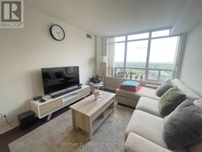 Toronto (Willowdale East) condo for rent - A living room with a flat screen TV and a couch.