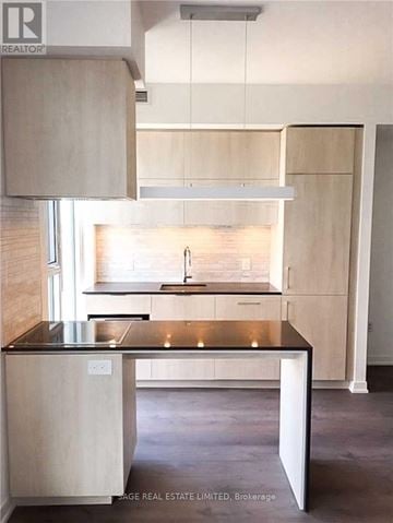 Toronto (Waterfront Communities) condo for rent - A kitchen with a sink and a window.