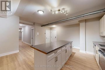 Hamilton (Blakeley) multi-family for rent - A kitchen with a counter top and cabinets.