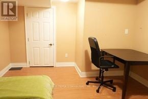 Mississauga (Creditview) apartment for rent - A room with a desk and a chair.