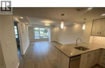 Vineland condo for rent - A kitchen with a sink and cabinets.