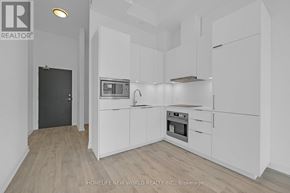 Toronto (Newtonbrook East) condo for rent - A man in a swimming pool with a woman sitting on the edge.