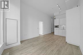 Toronto (Newtonbrook East) condo for rent - A movie theater with rows of black chairs facing a large screen.