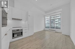 Toronto (Newtonbrook East) condo for rent - A row of blue chairs are arranged in a room with a carpeted floor.