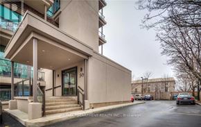 Hamilton (Central) condo for rent - A building with the number 50 on it.