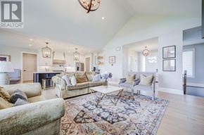 Kawartha Lakes (Manvers) apartment for rent - A living room with a rug and a couch.