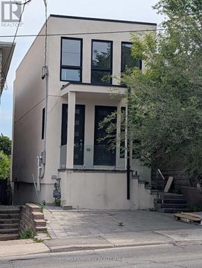 Toronto (Oakwood Village) apartment for rent - A two-story building with a balcony on the second floor.