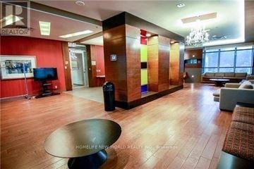 Toronto (Bendale) condo for rent - A living room with a black coffee table in the middle of the room.