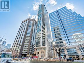 Toronto (Kensington-Chinatown) condo for rent - A cityscape with a REALTOR® logo in the corner.