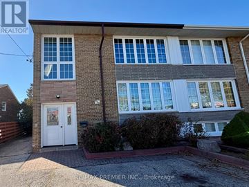 Toronto (Brookhaven-Amesbury) apartment for rent - A house with a white door and windows is for sale.