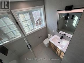 Toronto (Brookhaven-Amesbury) apartment for rent - A bathroom with a skylight and a sink.
