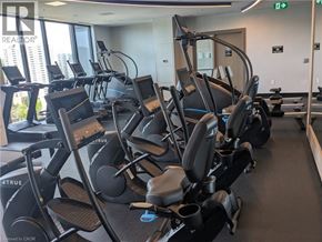 Hamilton condo for rent - A gym with a row of treadmills.