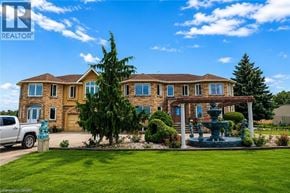 Hamilton apartment for rent - A house with a fountain in front of it.