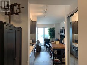 Toronto (Mount Pleasant West) condo for rent - A well-lit kitchen with a dining table and chairs.