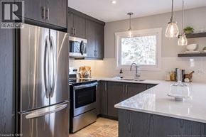 Hamilton apartment for rent - A modern kitchen with a stainless steel refrigerator and dark wood cabinets.