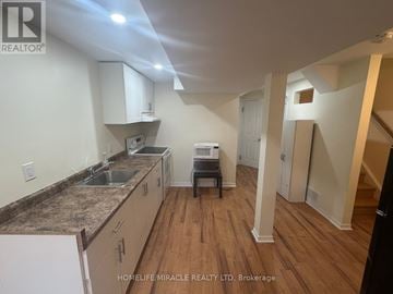 Mississauga (East Credit) apartment for rent - A kitchen with a sink and a counter top.