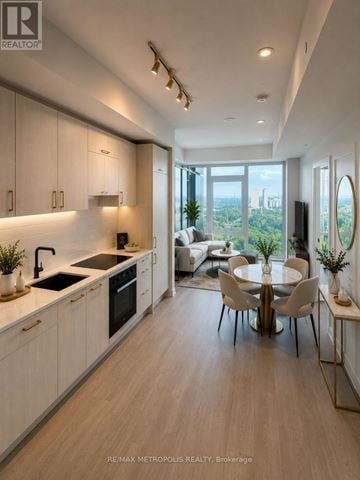 Toronto (Banbury-Don Mills) condo for rent - A modern kitchen with a dining table set up with chairs.