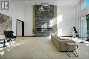 Ottawa condo for rent - A modern living room with a stone wall and a fireplace.