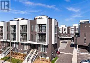 Ajax (Central) townhouse for rent - A building with the logo REALTOR on the top left corner.