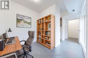 Ajax (Central) townhouse for rent - A room with a desk, chair, and bookshelf.