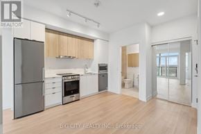 Vaughan (Brownridge) condo for rent - A modern kitchen with a refrigerator, oven, and sink.