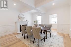 New Tecumseth (Tottenham) apartment for rent - A dining room with a fireplace and chairs.