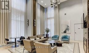 Mississauga (City Centre) condo for rent - A living room with a large window covered in curtains.