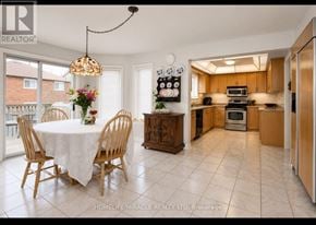 Mississauga (East Credit) apartment for rent - A dining room with a table set for four with a chandelier hanging above it.
