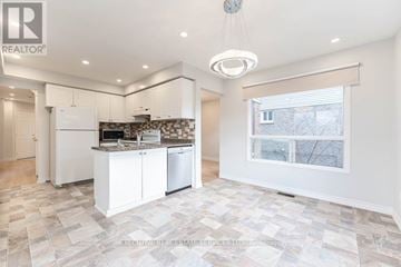 Whitby (Blue Grass Meadows) apartment for rent - A well-lit kitchen with a tiled floor and a large window.