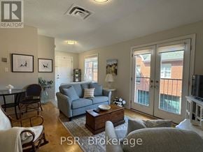 Toronto (Leaside) apartment for rent - A living room with a couch, chairs, and a coffee table.