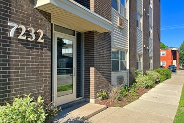 Forest Park apartment for rent - A building with the number 7232 on it.