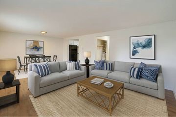 Lakewood apartment for rent - A living room with a grey couch and a coffee table.
