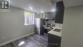 Brampton (Northwest Brampton) apartment for rent - A kitchen with a sink, stove, and refrigerator.
