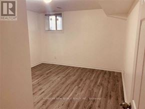 Toronto (Agincourt South-Malvern West) apartment for rent - A room with wooden flooring and a window.