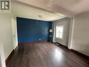 Chatham apartment for rent - A room with wooden flooring and a blue wall.