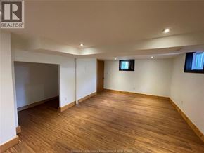 Chatham apartment for rent - A room with wooden flooring and white walls.