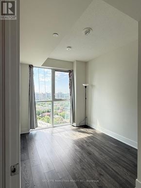 Toronto (Don Valley Village) condo for rent - A room with a view of the city through the window.