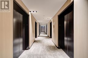 Mississauga (Mississauga Valleys) condo for rent - A long hallway with doors on both sides and a carpet on the floor.