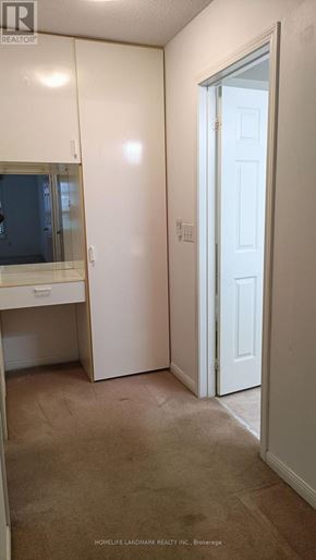 Markham (Unionville) townhouse for rent - A room with a desk and a door.