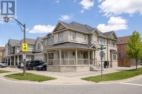 Ajax (Northeast Ajax) apartment for rent - A large house with a car parked in front.