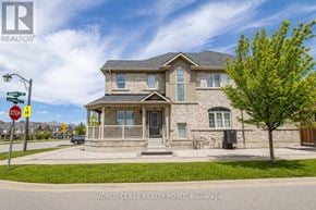 Ajax (Northeast Ajax) apartment for rent - A house with a stop sign in front of it.