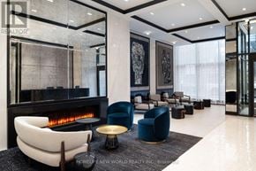 Toronto (Bay Street Corridor) condo for rent - A modern living room with a fireplace and comfortable seating.