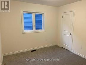 Brantford apartment for rent - A room with a window and a door is for sale.