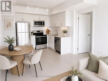 Toronto (Humber Heights) condo for rent - A modern kitchen with a dining table and chairs.