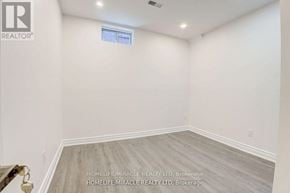 Pickering (Liverpool) apartment for rent - A room with a window and a wooden floor.