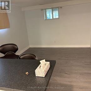Mississauga (Streetsville) apartment for rent - A room with a table and chairs and a window.