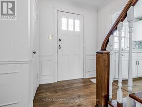 Burlington (Lasalle) apartment for rent - A white door with a window above it in a room.