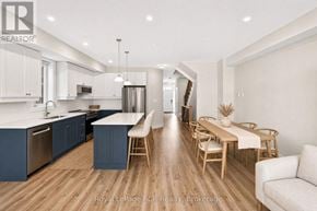 Blue Mountains apartment for rent - A modern kitchen with a dining area in a property.